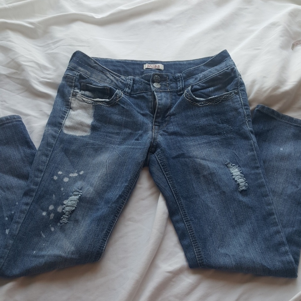 Distressed bleached jeans